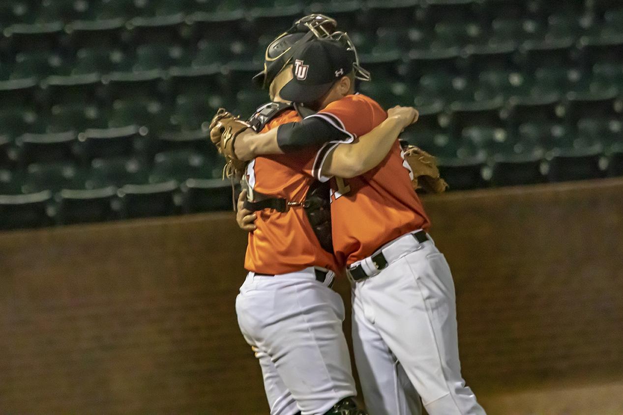 Charles Hall celebrates after breaking the DII baseball record. 