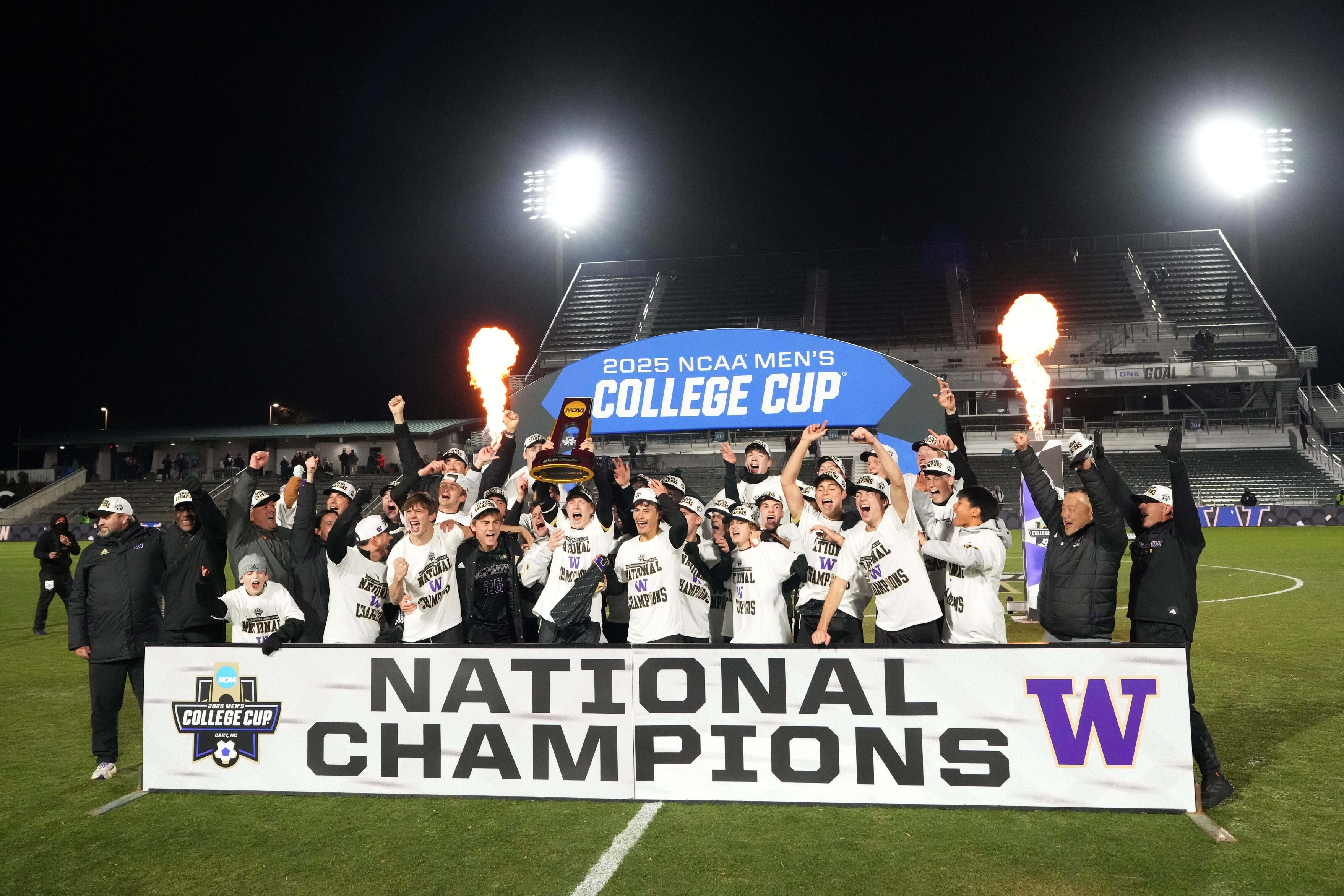 Washington Huskies celebrate after winning the National Championship in overrtime at First Horizon Stadium